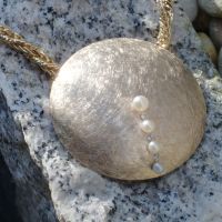 Kreisscheibe mit Perlen